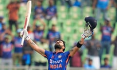 Virat Kohli celebrates after reaching his century