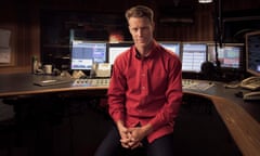 Tom Tilley sitting in a radio recording studio