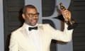 Get Out director Jordan Peele, with his award for best screenplay