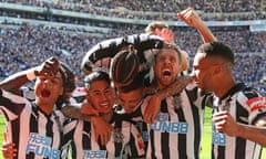 Newcastle players celebrate the third goal scored by Ayoze Perez against Chelsea.