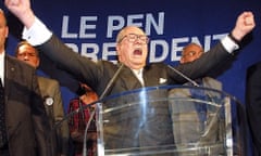 French National Front presidential candidate Jean-Marie Le Pen celebrates after singing the French national anthem at his campaign headquarters, 21 April 2002.