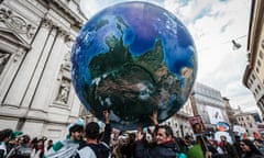 Global Climate March Held In Rome<br>ROME, ITALY - NOVEMBER 29: Demonstrators carry a big Earth as they take part in the 'Global Climate March' on November 29, 2015 in Rome, Italy.

The awareness event took place ahead of the 21st Session of the Conference of the Parties to the United Nations Framework Convention on Climate Change (COP21), which is scheduled to start in Paris on Monday.

PHOTOGRAPH BY Giuseppe Ciccia / Pacific Press / Barcroft India

UK Office, London.
T +44 845 370 2233
W www.barcroftmedia.com

USA Office, New York City.
T +1 212 796 2458
W www.barcroftusa.com

Indian Office, Delhi.
T +91 11 4053 2429
W www.barcroftindia.com