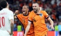 Stefan de Vrij celebrates his equaliser with Netherlands teammate Xavi Simons.