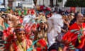 Crowds wearing costumes pack the streets during the parade on the second day of the 2023 Notting Hill carnival