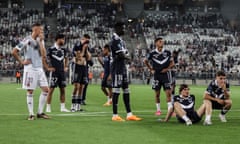 Bordeaux’s players react after their match with Rodez was abandoned