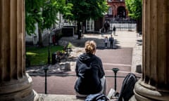 Student at University College London (UCL) looking towards the Cruciform building.