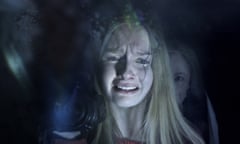 In this image released by Universal Pictures, Olivia DeJonge, foreground, and Deanna Dunagan appear in a scene from the film, "The Visit." (Universal Pictures via AP)