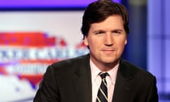 Tucker Carlson<br>FILE - Tucker Carlson, host of "Tucker Carlson Tonight," poses for photos in a Fox News Channel studio on March 2, 2017, in New York. A racist text message from Tucker Carlson is what helped drive the commentator's ouster from Fox News, The New York Times reports. The Times says that in a text uncovered as part of a recent defamation lawsuit, the former Fox host lamented how supporters of former President Donald Trump ganged up to beat a protester. “It's not how white men fight,” Carlson wrote. (AP Photo/Richard Drew, File)