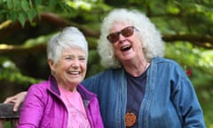 Dining Across the Dividers Katie (on left) and Anne, sitting on a bench in the Botanic Garden in Dunoon, Scotland, UK, May 2023