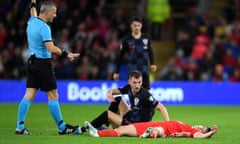 Wales v Croatia - UEFA Euro 2020 Qualifier<br>CARDIFF, WALES - OCTOBER 13: Daniel James of Wales lies on the ground after colliding with Borna Barisic of Croatia during the UEFA Euro 2020 qualifier between Wales and Croatia at Cardiff City Stadium on October 13, 2019 in Cardiff, Wales. (Photo by Alex Davidson/Getty Images)