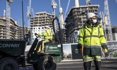 Construction workers wear masks