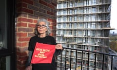 Aysen Dennis on the balcony of the flat she has moved into