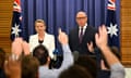 Australian opposition leader Peter Dutton and deputy leader Sussan Ley in front of the media