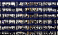 workers pictured late at night in an office block