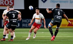 Marcus Smith chases the ball as Harlequins take on Racing 92 in the Champions Cup