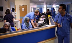 Members of clinical staff work at computers in the Accident and Emergency department of the ‘Royal Albert Edward Infirmary’ in Wigan