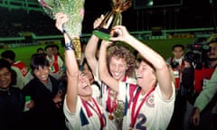 Michelle Akers (centre), who scored both goals in USA’s 2-1 win over Norway, holds the World Cup as she celebrates with Julie Foudy (left) and Carin Jennings in 1991.