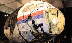 The reconstructed front of the MH17 plane that was downed by a missile over Ukraine, at Gilze-Rijen Air Force Base, The Netherlands. 