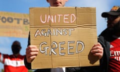 Manchester United fans protest against the club’s involvement in the European Super League.