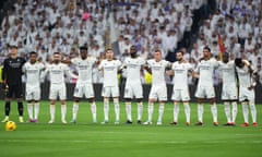 Real Madrid players line up arm-in-arm before their game against Almería on Sunday