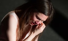 Amanda Knox wipes away tears as she speaks at the Criminal Justice festival in Modena.