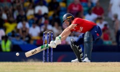 Jos Buttler of England stretches with his bat during the T20 World Cup match against Australia