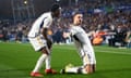 Real Madrid’s Joselu and Vinícius Júnior celebrate with the fans after the Spanish striker’s second of his two goals against Getafe.