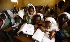 Sudanese girls sit in a classroom at at the El-Riyadh camp for internally displaced persons (IDP) in Geneina, the capital of the state of Sudan’s West Darfur, on February 8, 2017. / AFP PHOTO / ASHRAF SHAZLYASHRAF SHAZLY/AFP/Getty Images