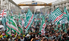 Workers attend a national rally organized by CISL union, in Sesto San Giovanni, near Milan, Italy, Thursday, Dec. 4, 2014. (AP Photo/Luca Bruno)