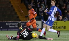 Jermain Defoe of Rangers slides the ball past the Kilmarnock goalkeeper Daniel Bachmann and the post in the sides’ goalless draw at Rugby Park.