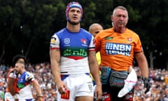 Knights star Kalyn Ponga leaves for a HIA after a tackle against Wests Tigers at Leichhardt Oval in Rd.2.