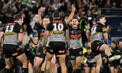 The Penrith Panthers celebrate their victory in the 2022 NRL grand final against Parramatta Eels.