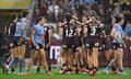 Tazmin Rapana of the Maroons celebrates after scoring a try during game three of the 2024 Women's State of Origin series at Queensland Country Bank Stadium.