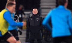 Wayne Rooney watches Derby’s players warm up