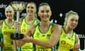 Diamonds captain Liz Watson lifts the Constellation cup trophy after Australia won the series despite defeat to New Zealand in game four.