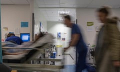 A busy hospital with doctors, nurses and staff busy at work