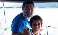 Murrumu Walubara and his son Thoyo on a boat trip.