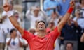 Novak Djokovic celebrates winning the men's singles at Roland Garros