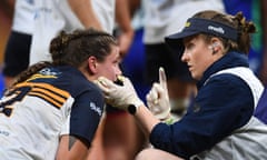 Harriet Elleman of the Brumbies is checked for concussion during the round six Super W match between the Fijian Drua and the ACT Brumbies at Suncorp Stadium on April 09, 2022 in Brisbane, Australia. Several sporting organisations will have to rethink their concussion rules following plagiarism allegations against a leading international concussion expert Dr Paul McCrory. Photo by Albert Perez/Getty Images