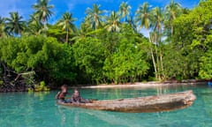 Boys fishing in the Marovo lagoon, Solomon Islands, Pacific.