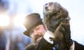 “Punxsutawney Phil” Makes Annual Winter Prediction On Groundhog Day<br>PUNXSUTAWNEY, PA - FEBRUARY 02: Punxsutawney Phil is held up by his handler for the crowd to see during the ceremonies for Groundhog day on February 2, 2018 in Punxsutawney, Pennsylvania. Phil predicted six more weeks of winter after seeing his shadow. Groundhog Day is a popular tradition in the United States and Canada where people await the sunrise and the groundhog’s exit from his winter den. If Punxsutawney Phil sees his shadow he regards it as an omen of six more weeks of bad weather and returns to his den. Early spring arrives if he does not see his shadow, causing Phil to remain above ground. (Photo by Brett Carlsen/Getty Images)