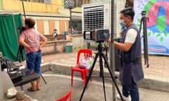 A patient is scanned by the portable X-ray machine in Philippines