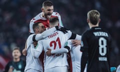 FC Köln players celebrate beating Werder Bremen 7-1 on Saturday