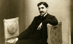 Black and white photograph of Marcel Proust posing in a studio