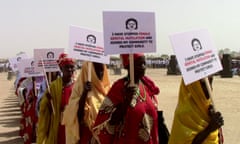 Women who used to carry out female genital mutilation march against the practice in Wassu, the Gambia, in 2014.