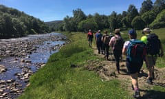 Group of walkers next to a stream on the Moray Walking & Outdoor Festival
