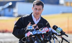 FILE PHOTO: U.S. Transportation Secretary Pete Buttigieg visits the site of the derailment of a train carrying hazardous waste in East Palestine, Ohio<br>FILE PHOTO: U.S. Transportation Secretary Pete Buttigieg speaks as he visits the site of the derailment of a train carrying hazardous waste in East Palestine, Ohio, U.S., February 23, 2023. REUTERS/Alan Freed/File Photo