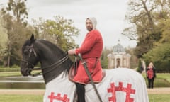 A knight sits atop his horse