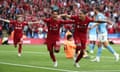 Darwin Nunez of Liverpool (right) celebrates scoring their third goal.