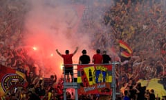 Ligue 1 - RC Lens v Lille<br>Soccer Football - Ligue 1 - RC Lens v Lille - Stade Bollaert-Delelis, Lens, France - October 8, 2023 RC Lens fans with flares inside the stadium before the match REUTERS/Pascal Rossignol